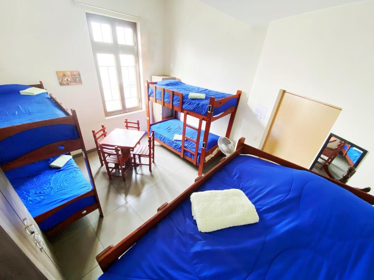 Cama en habitación compartida de 6 camas