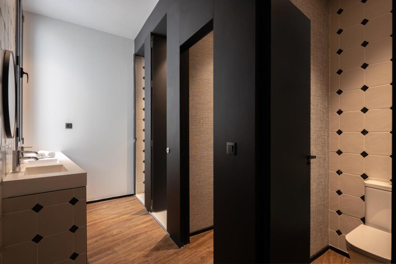 Cama en habitación compartida de 8 camas