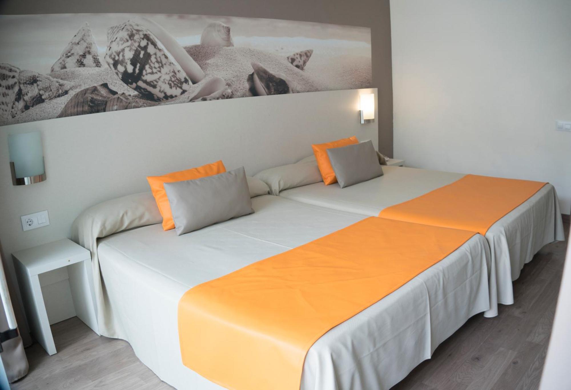 Habitación Cuádruple (2 adultos + 2 niños)