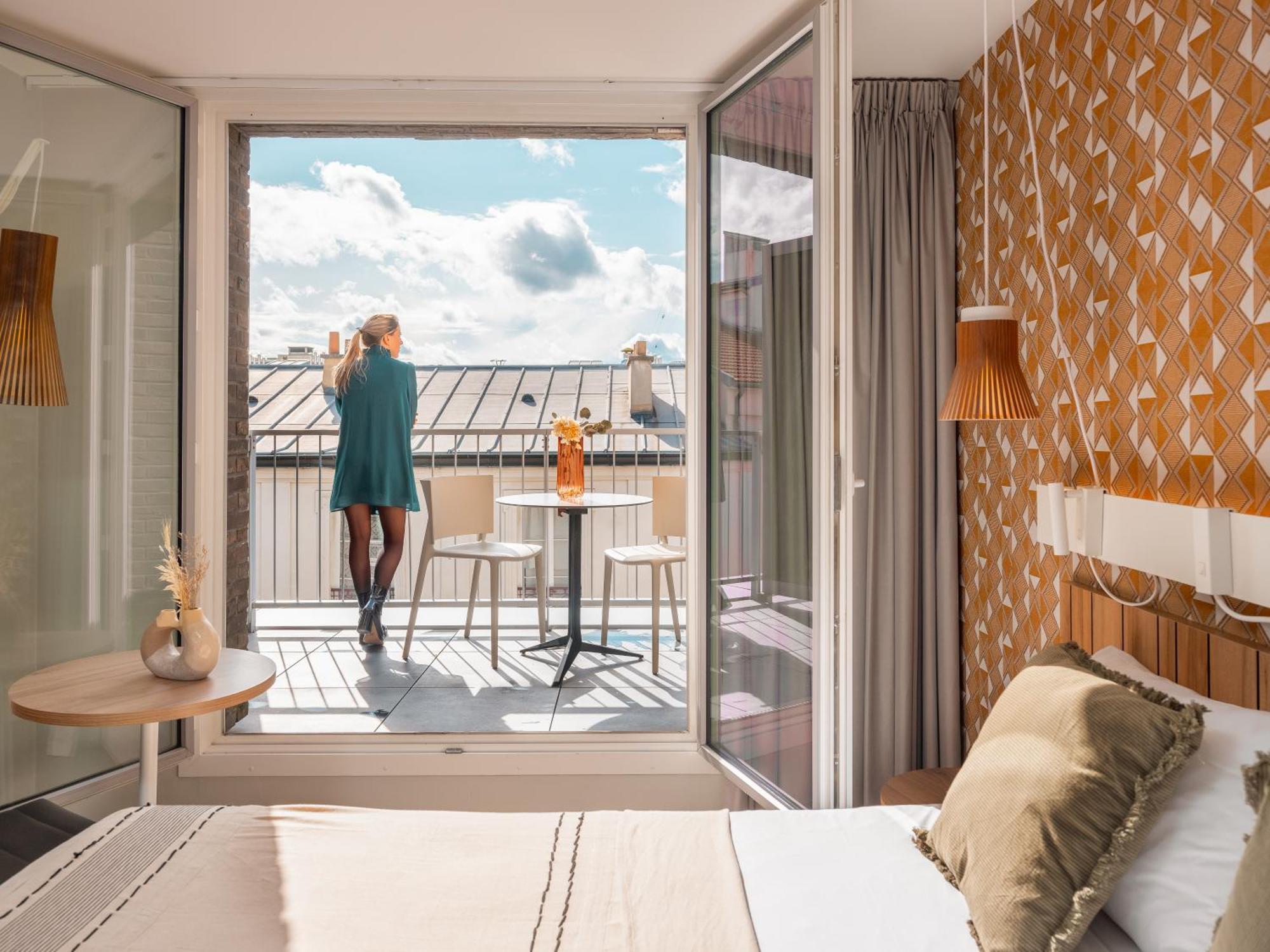 Habitación Superior con cama grande y balcón