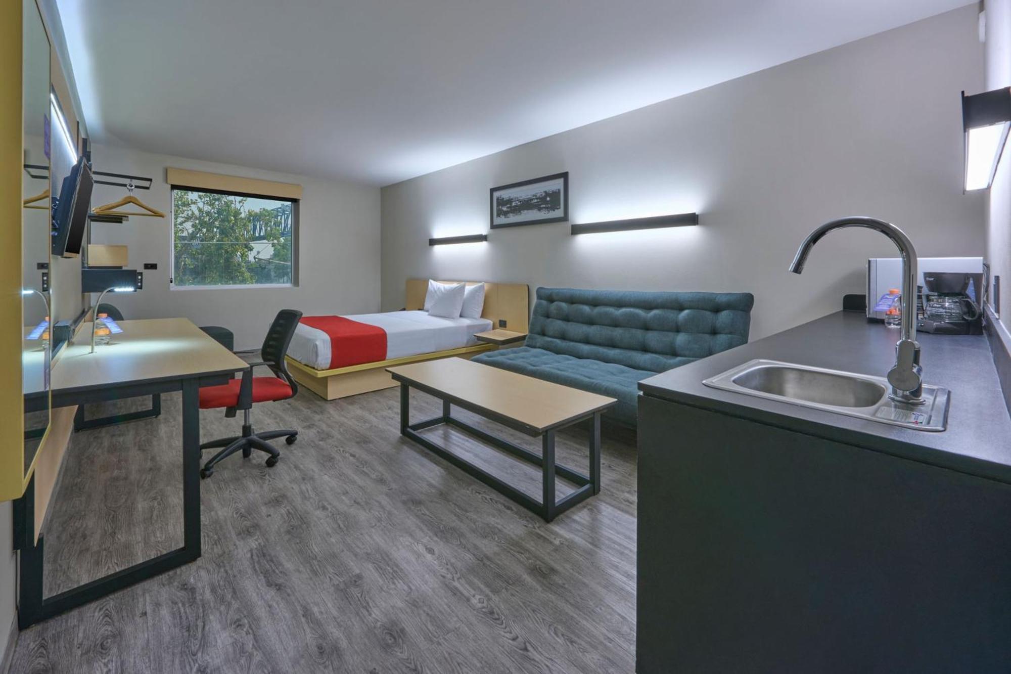 Habitación Doble Superior con sofá cama