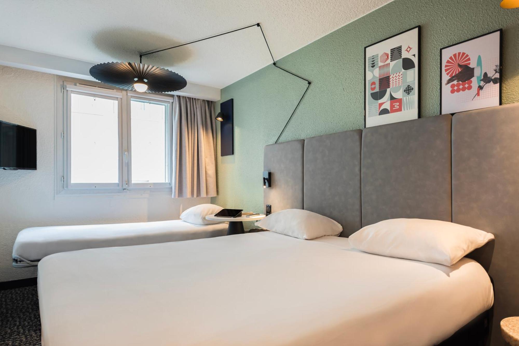 Habitación Estándar con 1 cama doble y 1 sofá cama para 1 persona