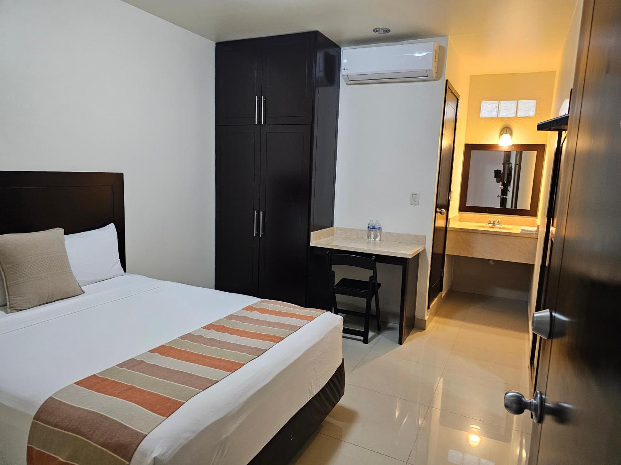 Habitación Doble Económica - 1 cama grande