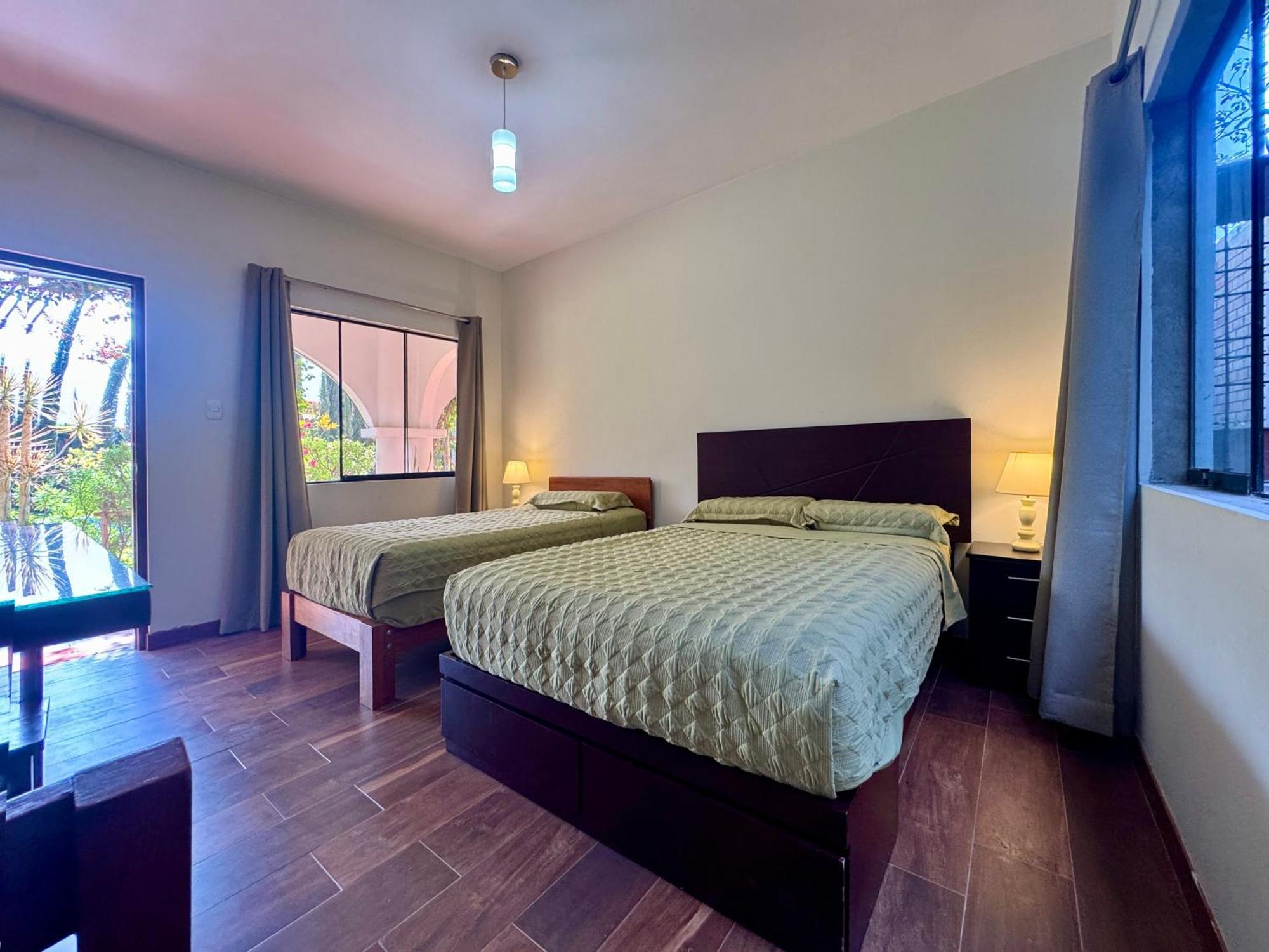 Habitación Familiar con vistas al jardín