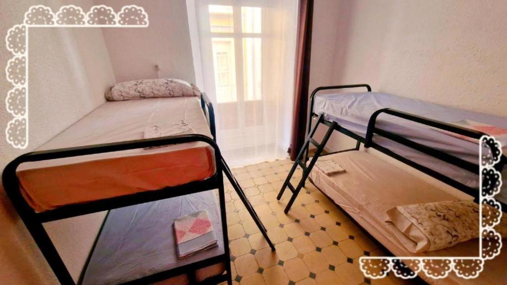 Cama en habitación compartida mixta de 4 camas