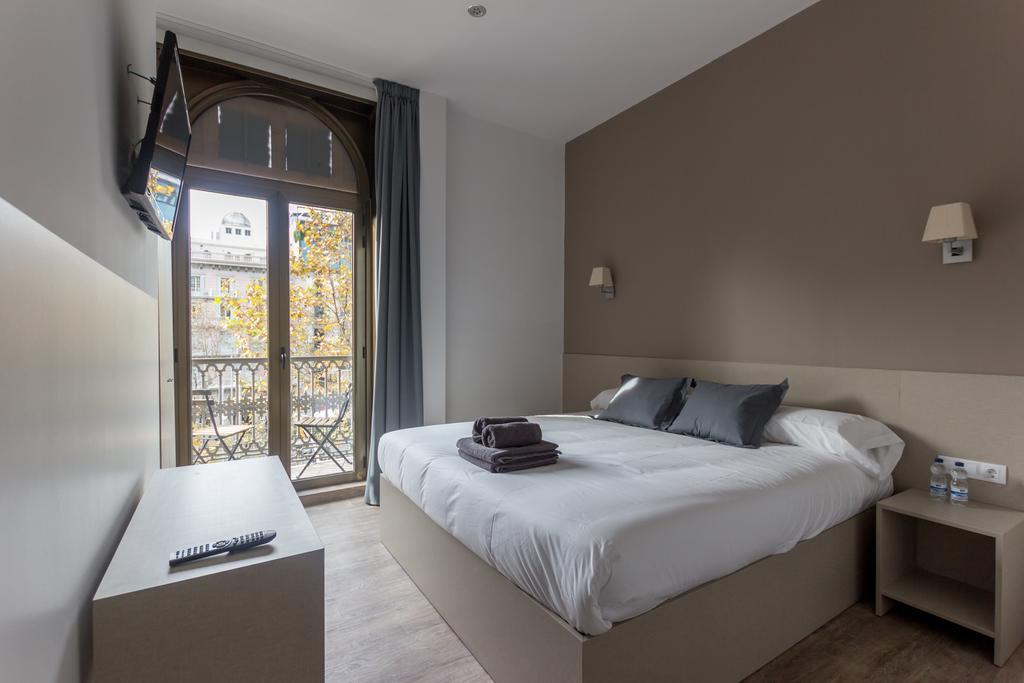 Habitación Doble con balcón y vistas a la ciudad