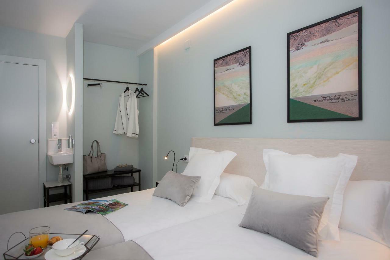 Habitación Doble con baño privado externo - 2 camas
