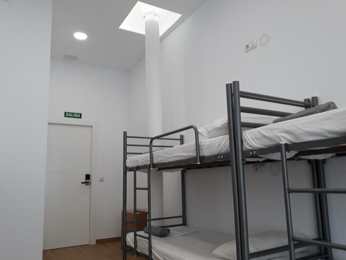 Cama en habitación compartida mixta de 8 camas