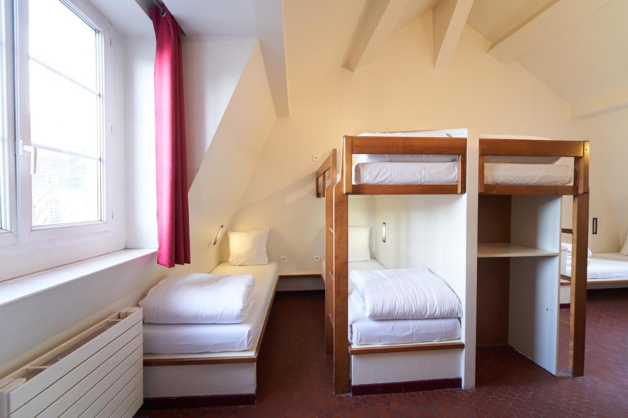 Cama Individual en habitación compartida femenina
